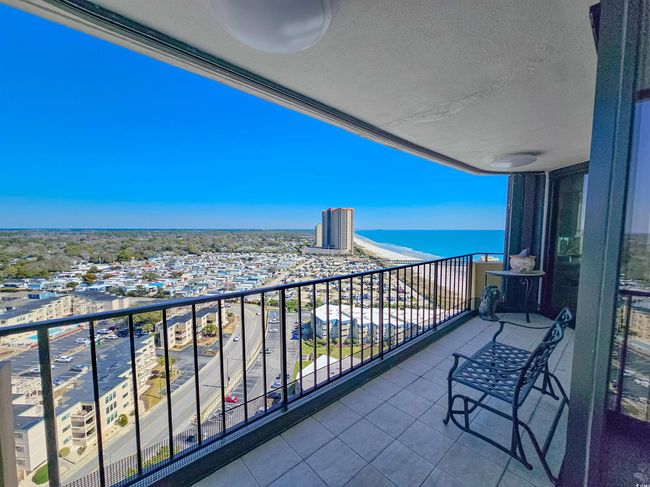 Balcony featuring a water view | Image 21