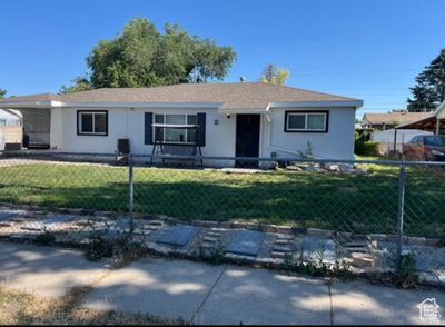 View of front of house featuring a front lawn | Image 1