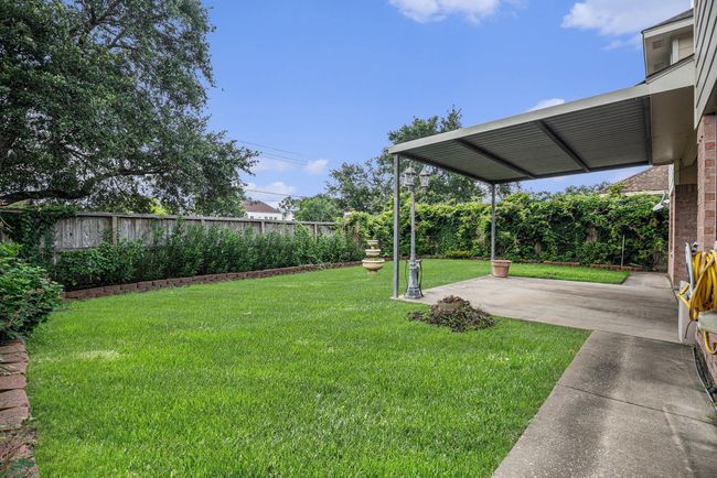 Side view of backyard. | Image 36