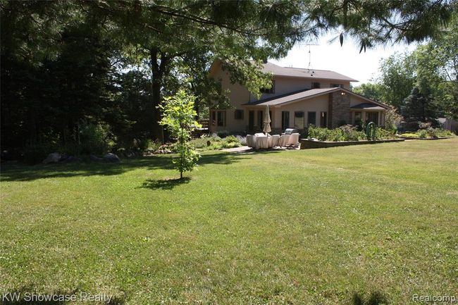 Backyard, facing house. | Image 62