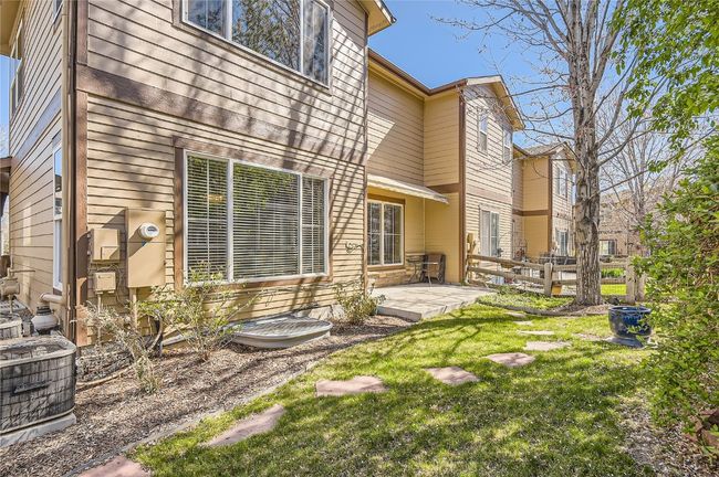 View of this beautiful home from the fenced in yard. | Image 24