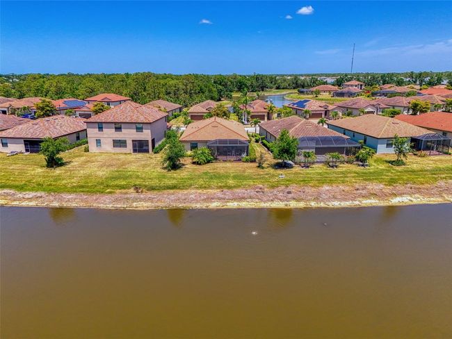 12315 Canavese Ln, House other with 4 bedrooms, 3 bathrooms and null parking in Venice FL | Image 56