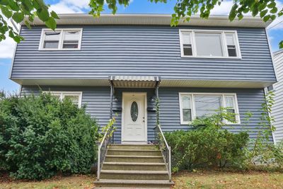 Single Front Door Entry for Both Floor Units | Image 1