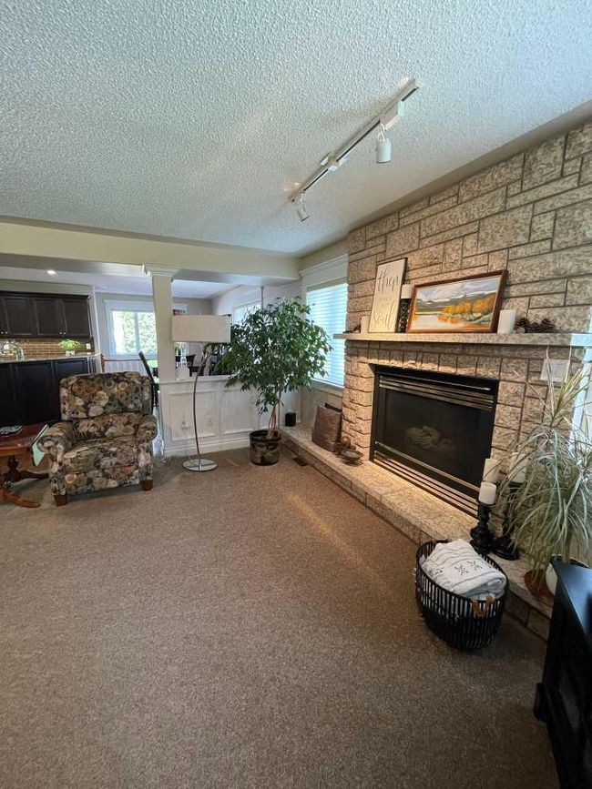 24 Evergreen Park Close W, Home with 4 bedrooms, 3 bathrooms and 5 parking in Brooks AB | Image 16