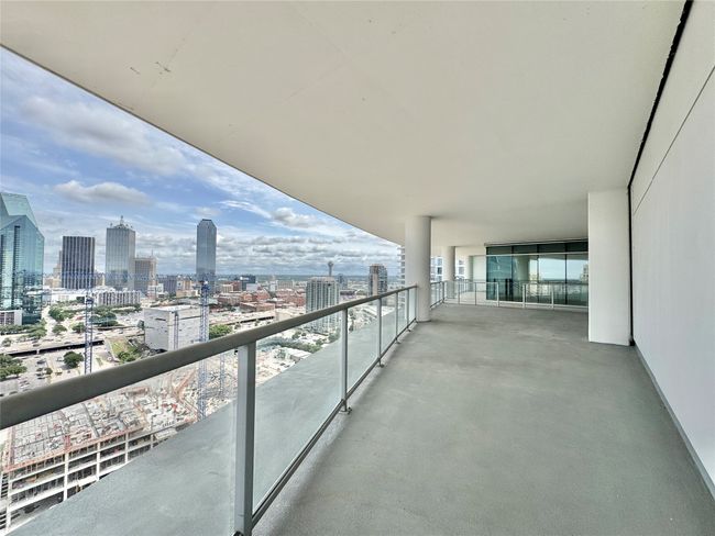 Balcony featuring a skyline view | Image 13