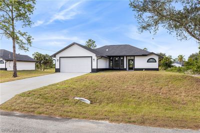 1515 E 9th Street, House other with 4 bedrooms, 2 bathrooms and null parking in Lehigh Acres FL | Image 2