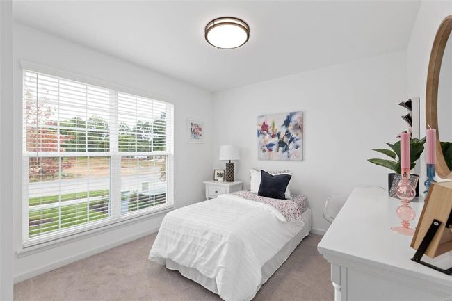 Bedroom with light carpet | Image 15