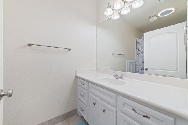Hall bath with tub/shower combo. | Image 30