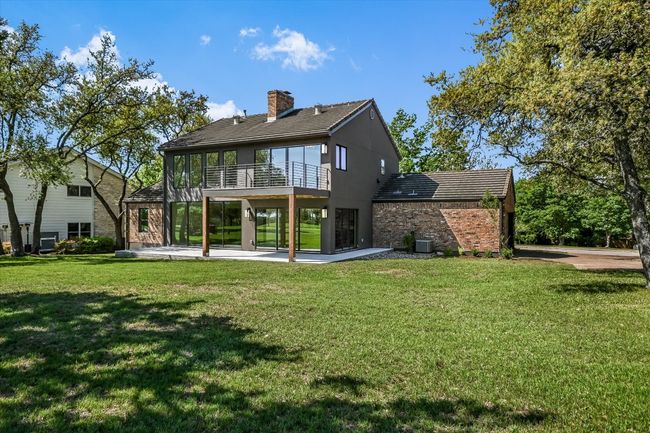Large backyard with plenty of space for a swimming pool. | Image 16