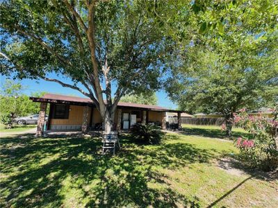 Back of house with a yard | Image 1