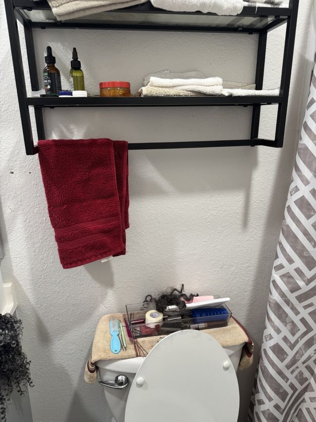 Bathroom view of toilet | Image 12