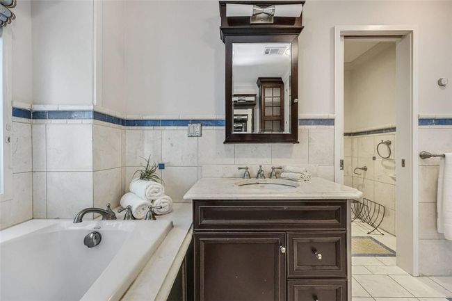 Jet tub and private water closet. | Image 18