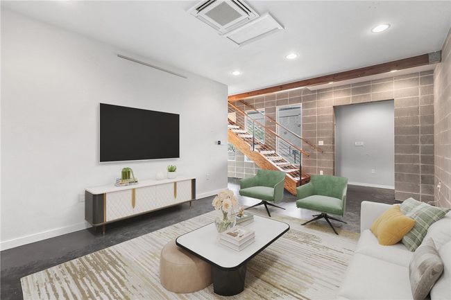 Living room with attic access, recessed lighting, and tile walls | Image 25