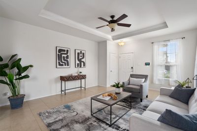 Living room with tray ceiling | Image 2