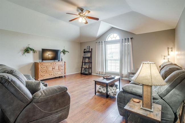 Living room with fan. | Image 9
