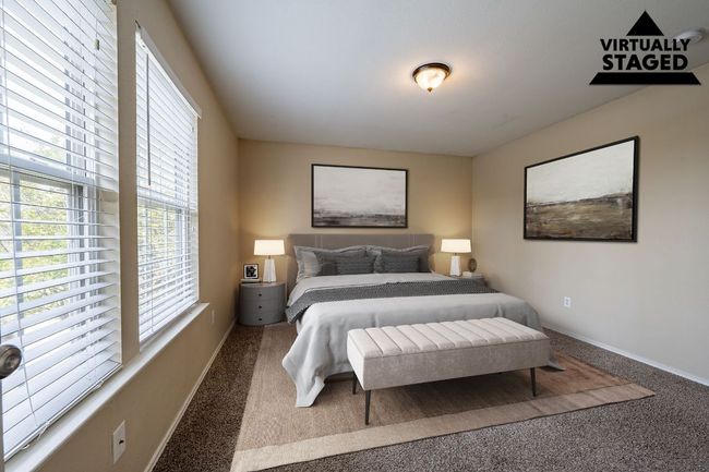 Bedroom with carpet floors and baseboards | Image 14