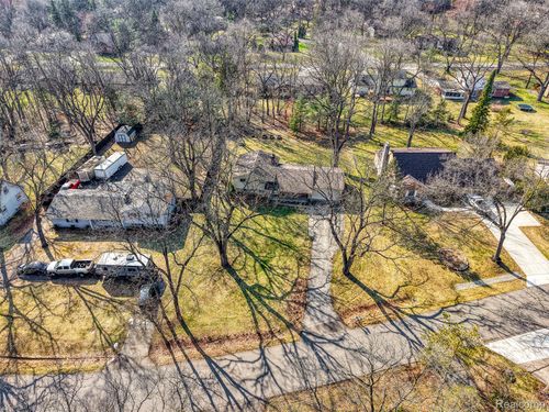 1243 Blue Heron Dr, Highland, MI, 48357-3909 | Card Image