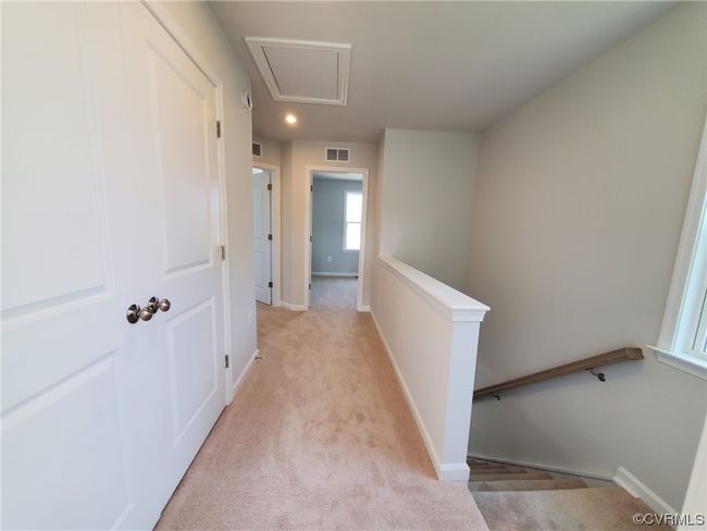 Spare room with dark carpet and plenty of natural light | Image 26
