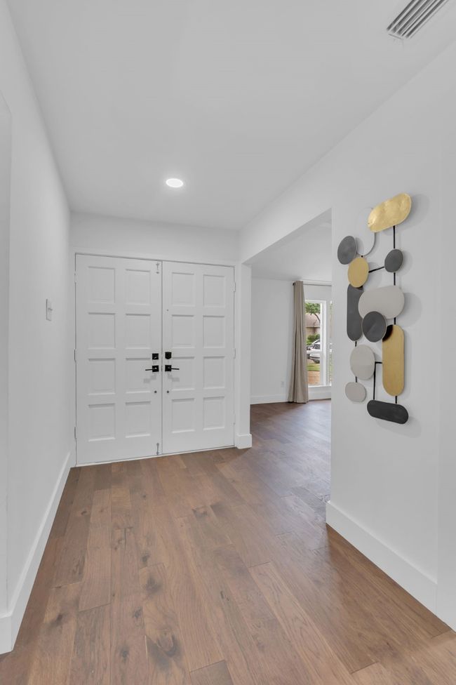 Foyer with visible vents, recessed lighting, baseboards, and wood finished floors | Image 5