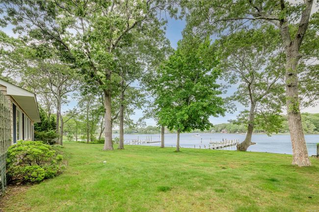 View of green lawn featuring a water view | Image 35