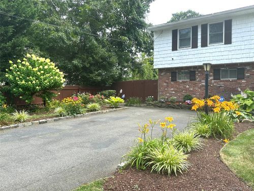 10 Jackson Ave, Brentwood, NY, 11717-3002 | Card Image