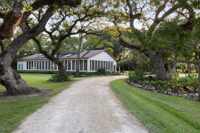 [Pool house] 37' x 73 The pool area is screened to take advantage of cross breezes & keep out debris & mosquitos. | Image 38