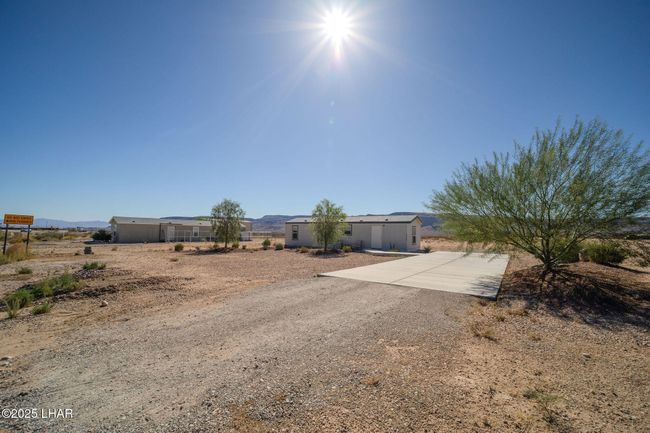 10747 Paradise Trails Rd, House other with 2 bedrooms, 1 bathrooms and null parking in Yucca AZ | Image 39