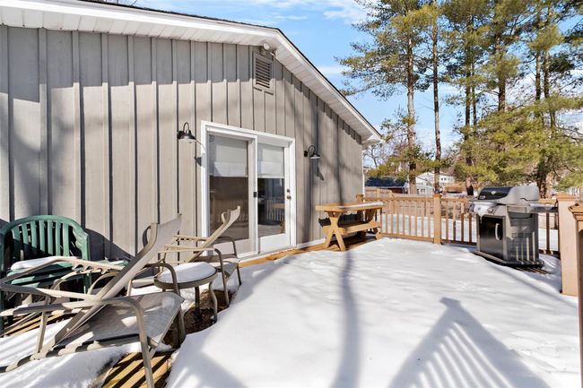 Wooden terrace featuring grilling area | Image 37