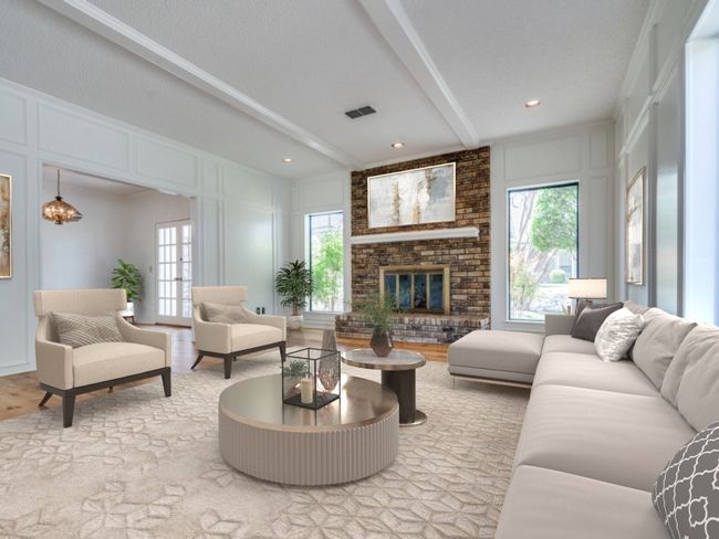 Big windows surround the fireplace. | Image 4