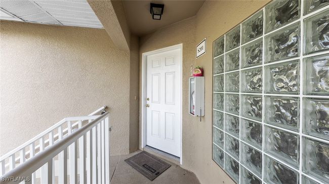 View of exterior entry with stucco siding | Image 20