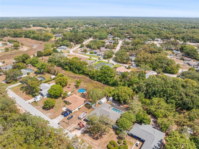 7660 Holiday Dr, House other with 4 bedrooms, 3 bathrooms and null parking in Spring Hill FL | Image 58