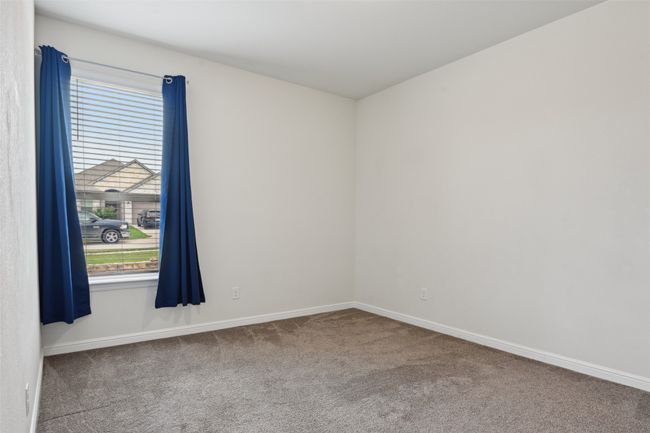 Spare room with carpet flooring and baseboards | Image 25