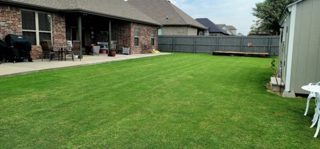 Seller thought you might like to see how green and lush the back yard is during the summer months. | Image 34