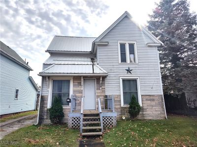 View of front of home with a front lawn | Image 2