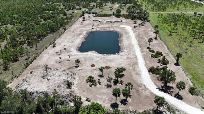 Aerial overview of property's location featuring a nearby body of water | Image 10