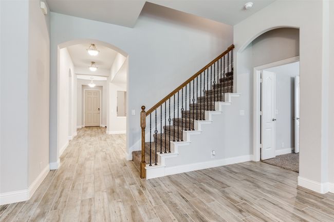 Stairs leading to gameroom. | Image 7
