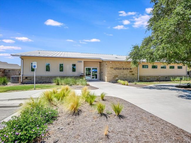 View of property featuring concrete driveway | Image 36