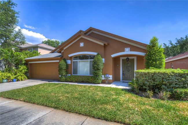 8858 Cypress Hammock Drive, House other with 3 bedrooms, 2 bathrooms and null parking in Tampa FL | Image 4