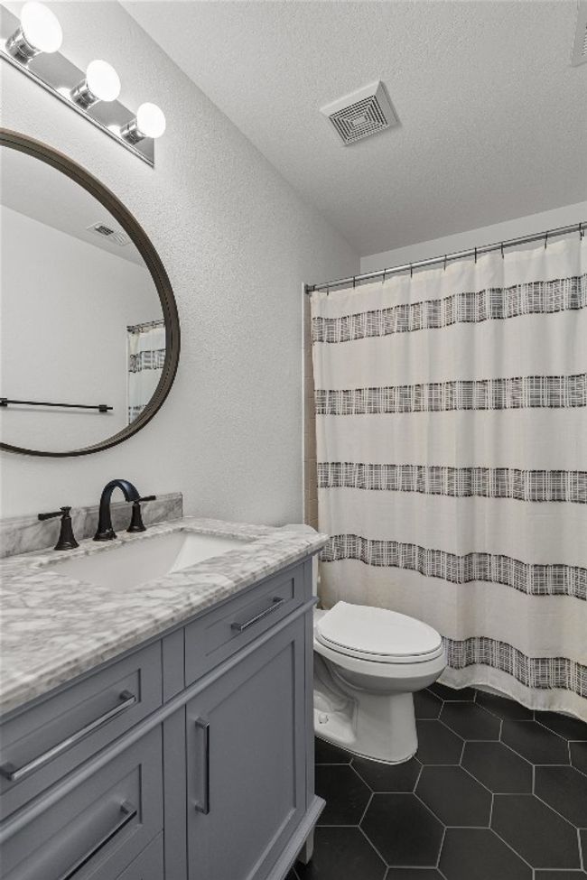 Bathroom featuring vanity and tile patterned floors | Image 27