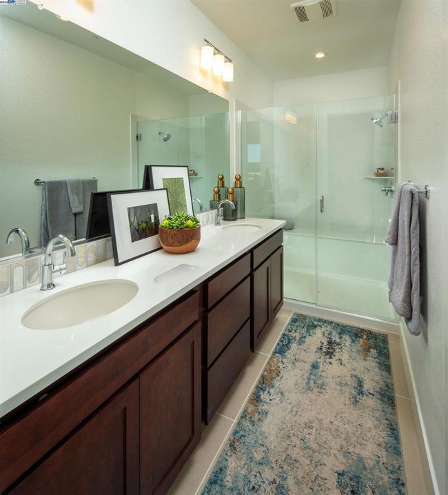 Photo is of the model home and not the actual home for sale. | Image 14