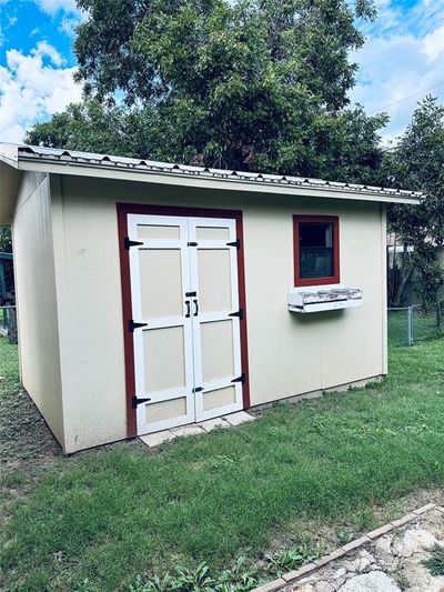 View of outbuilding with a yard | Image 2