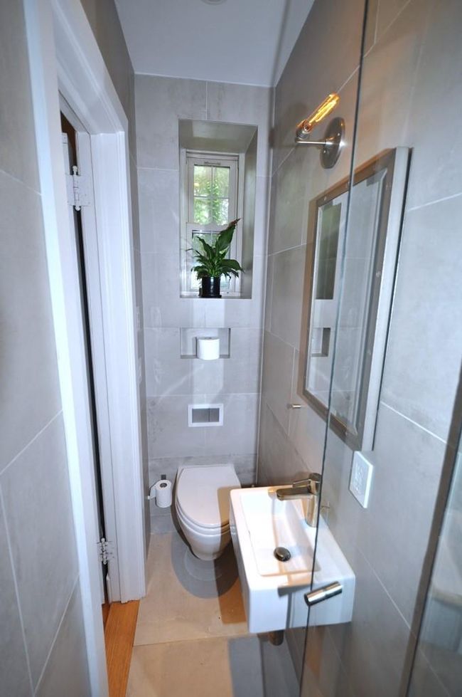 view 1 of the Renovated private bath off of the third bedroom, has step in shower, window for ventilation and heated floor. | Image 28