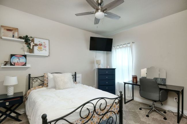 One of three secondary bedrooms upstairs. | Image 16