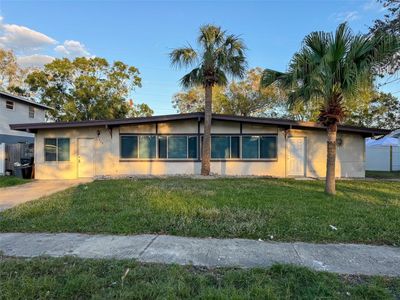 329 Country Club Drive, House other with 4 bedrooms, 2 bathrooms and null parking in OLDSMAR FL | Image 1