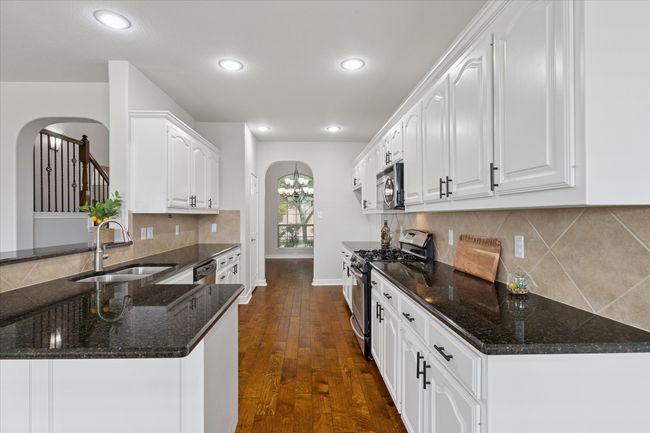 Kitchen open to living area | Image 12