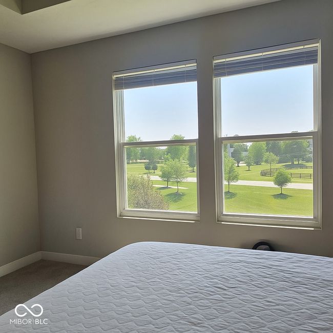 unfurnished bedroom featuring baseboards and carpet flooring | Image 16