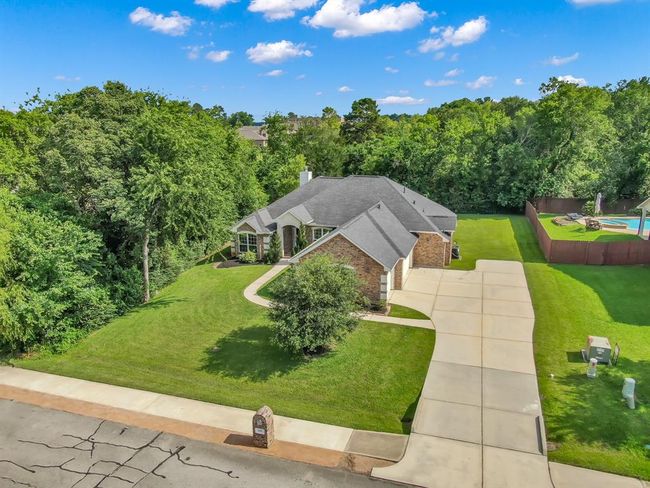 Extended driveway for parking & neighborhood sidewalks. | Image 37