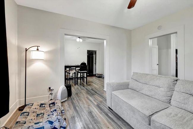 Living room flows to the dining room kitchen and 1 of the bedrooms. | Image 40