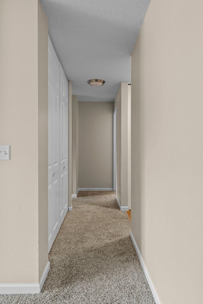Hallway with linen closet | Image 11