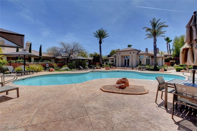 Pool with a patio and fence | Image 52